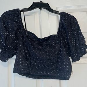 Black polka dotted going out top